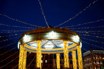 Beautifully illuminated gazebo in Plaza del Castillo during the night in Pamplona, Navarra, Spain