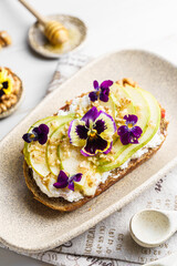 bruschetta with cottage cheese, pear, walnut and honey