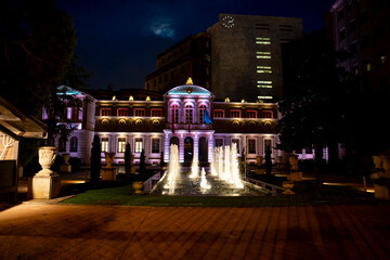 Illuminated historical building with fountains at night in Pamplona Navarra Spain