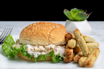 tuna salad  sandwich with broccoli fries