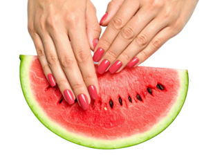 Female Hands with Red Manicure on Fresh Watermelon Slice with Green Leaves on Transparent Background