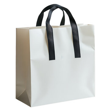 A clean white paper shopping bag with textured black ribbon handles isolated on transparent background