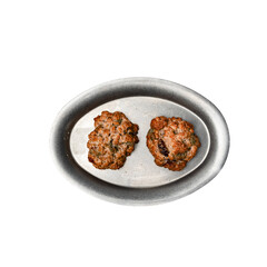 Homemade oatmeal cookies with nuts and dried fruits isolated on transparent background