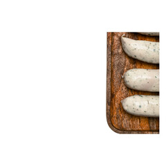 Fresh homemade chicken sausages with herbs on a rustic wooden cutting board, uncooked natural...