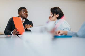 Colleagues collaborate and communicate effectively regarding work-related documents and strategies...