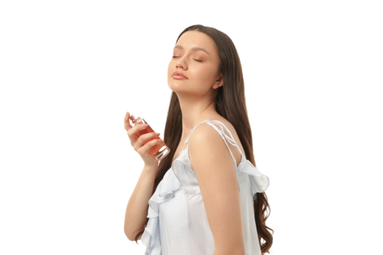 Woman with long hair spritzing perfume joyfully, isolated on white, PNG