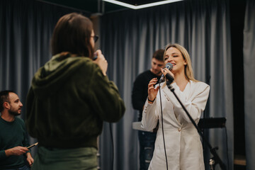 A dedicated band gathers in a professional studio, collaborating and performing music during their...