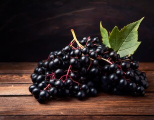 black grape background black grapes on a wooden table with copy space a photo of elderberry fruits