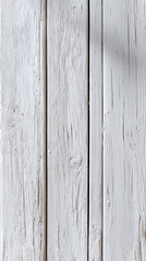 Fototapeta premium White wooden plank wall with textured grain and peeling paint in bright daylight, creating rustic and minimalist background with natural wood details and weathered surface