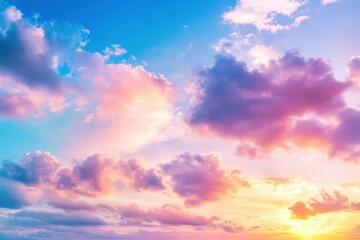 Fototapeta premium Colorful sunset sky with clouds over a tranquil landscape illuminated by warm evening light