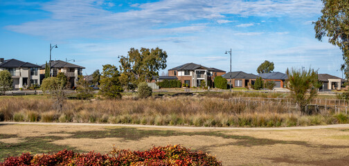 Panoramic view of a residential neighborhood in Lara, Australia, modern two-storey homes facing a...