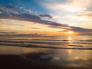 Obraz premium Sunrise on the sea beach During the summer holidays on the beaches of Paraná, southern Brazil.