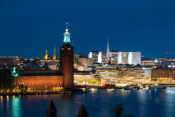 Fototapeta premium Stockholm city hall and surrounding buildings at night, Sweden.