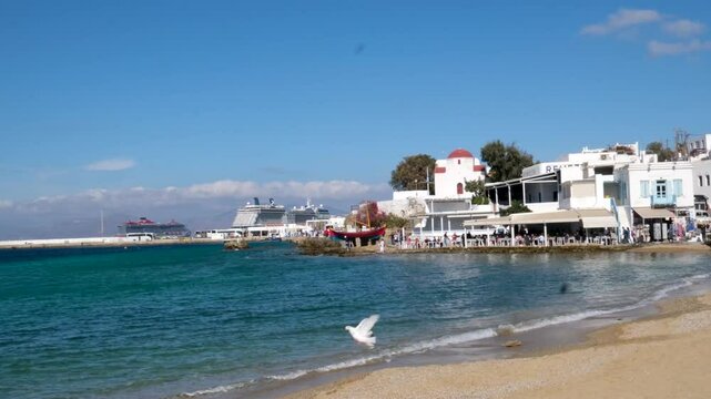 famous windmills of Mykonos island over seascape, Mykonos island, Greece. High quality 4k footage