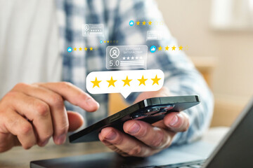 Customer giving five star feedback using smartphone. Concept of online review, service satisfaction, digital product rating and business reputation evaluation