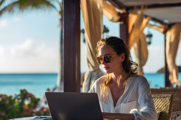 Beachfront Remote Work. Professional Woman Using Laptop at Tropical Seaside Café.