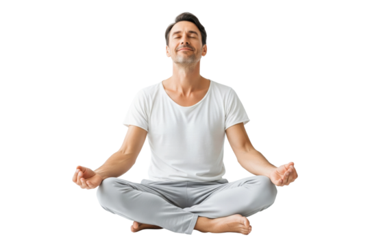 Peaceful man in comfortable clothing meditating in a lotus pose with eyes closed