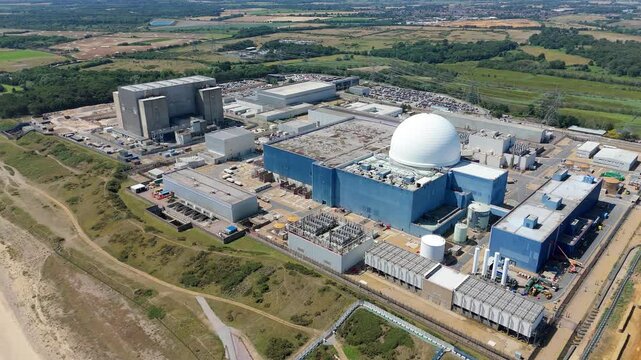 Aerial drone footage, Sizewell B nuclear power plant east coast of England Nuclear energy electricity generation North Sea powerlines 
