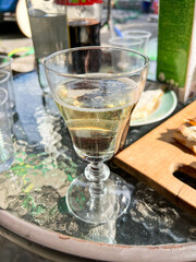 Elegant glass of sparkling wine enjoyed outdoors on a sunny day