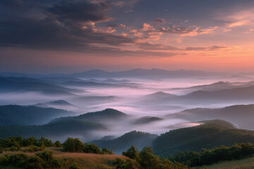 Obraz premium breathtaking summer sunrise in mountains where clouds kiss peaks and golden rays of sunlight break through mist