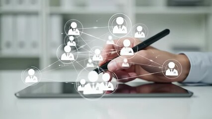 Hand Using Digital Pen on Tablet with Social Network Connection Icon on White Desk in Bright Office with White Bookshelf Network Structure - Powered by Adobe