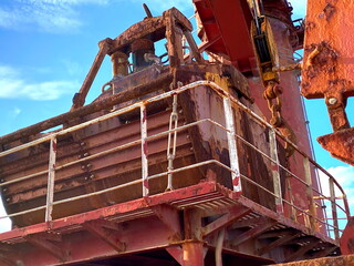 old ship's grab, out of order, rusted. lashed 