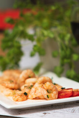 Crispy fried shrimp served on a white plate. Tasty seafood dish, close-up with natural lighting. Concept of gourmet food, restaurant serving, or homemade meal.Fried shrimp on white plate seafood 
