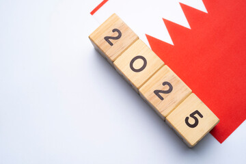 2025, Bahrain, Bahrain flag with date block, Concept, Important events for Bahrain in the new year,...