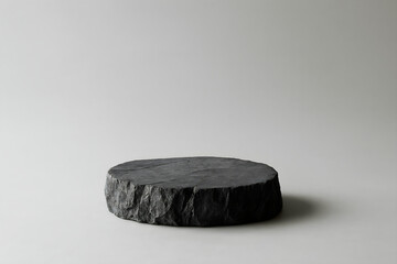 Rough Stone Pedestal on Gray Background