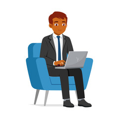 Young indian businessman sitting on a blue chair and using a laptop looking forward