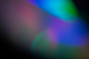 light leak overlay effect with colorful light leaks and grain ,retro grain noisy film distressed texture light leak flare on black background,retro film overlay