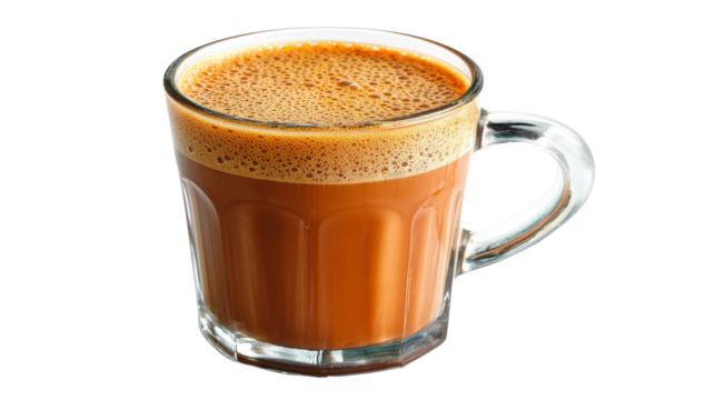 Frothy teh tarik pulled malaysian milk tea in a glass transparent background refreshing beverage concept