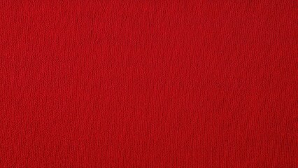 Fototapeta premium Zoomed-in perspective of uniform red knit fabric