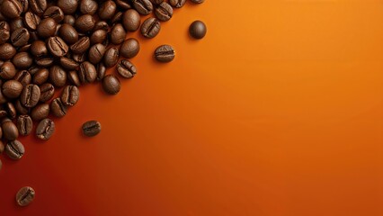 Zoomed-in image of coffee beans placed on a vivid orange background featuring blank space for text