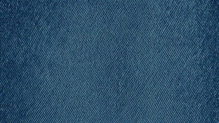 Close-up texture of blue denim fabric highlighting the weave and details of a classic jeans material background