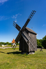 Traditional wooden windmill in Estonia countryside.