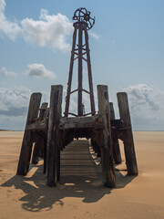 old ruined landing stage of st annes pier formerly used as a dock for cruise ships on the beach in...