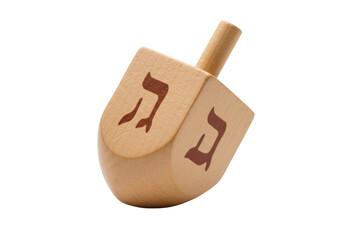 Wooden dreidel with hebrew letters isolated on transparent background