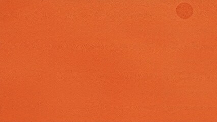 Fototapeta premium Distressed texture overlay on a vibrant orange backdrop