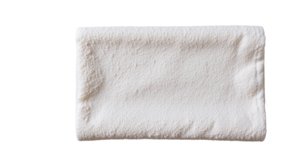 an item that appears to be a towel with frayed edges, placed against a contrasting background
