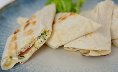 Cascione italian flatbread on white dish. 