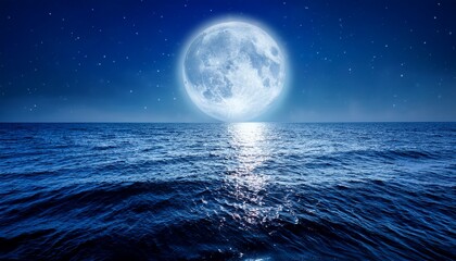 illuminated full moon over calm ocean waves at night creating a serene seascape