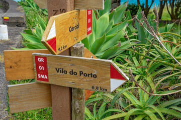 pedestrian path direction signs for Vila do Porto and Cardal in the Bay of São Lourenço, Azorean island of Santa Maria, Portugal