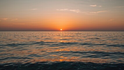 Tranquil ocean waves at dusk by the shore