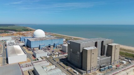 Aerial drone footage, Sizewell B nuclear power plant east coast of England Nuclear energy electricity generation North Sea powerlines 
