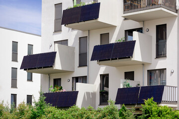 Solar Panels on Balconies of Modern Facade Residential Building. Balcony Solar Power Station on Modern Apartments Balcony. 