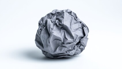 Crumpled gray paper ball on white background