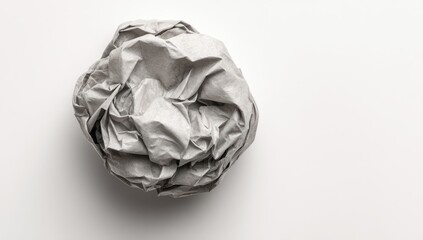 Crumpled paper ball on white background