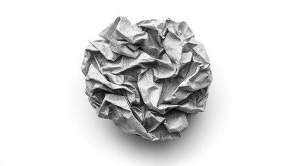 Crumpled paper ball against white background