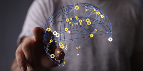 Abstract image of a hand interacting with a digital network, representing connection and global...